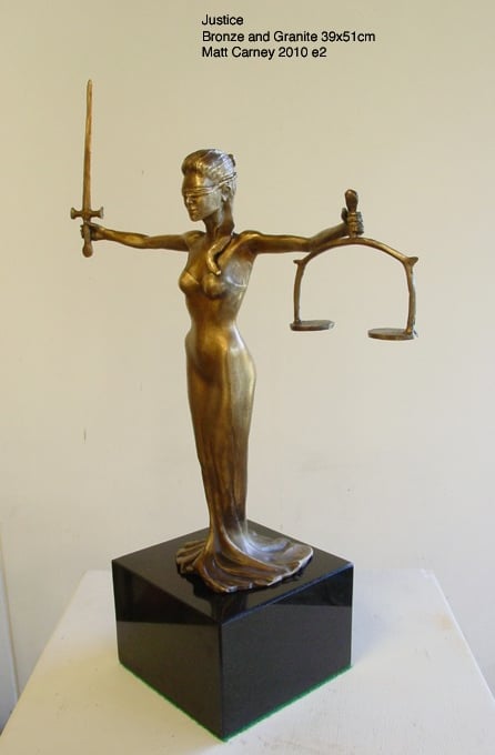 a statue of a lady justice 