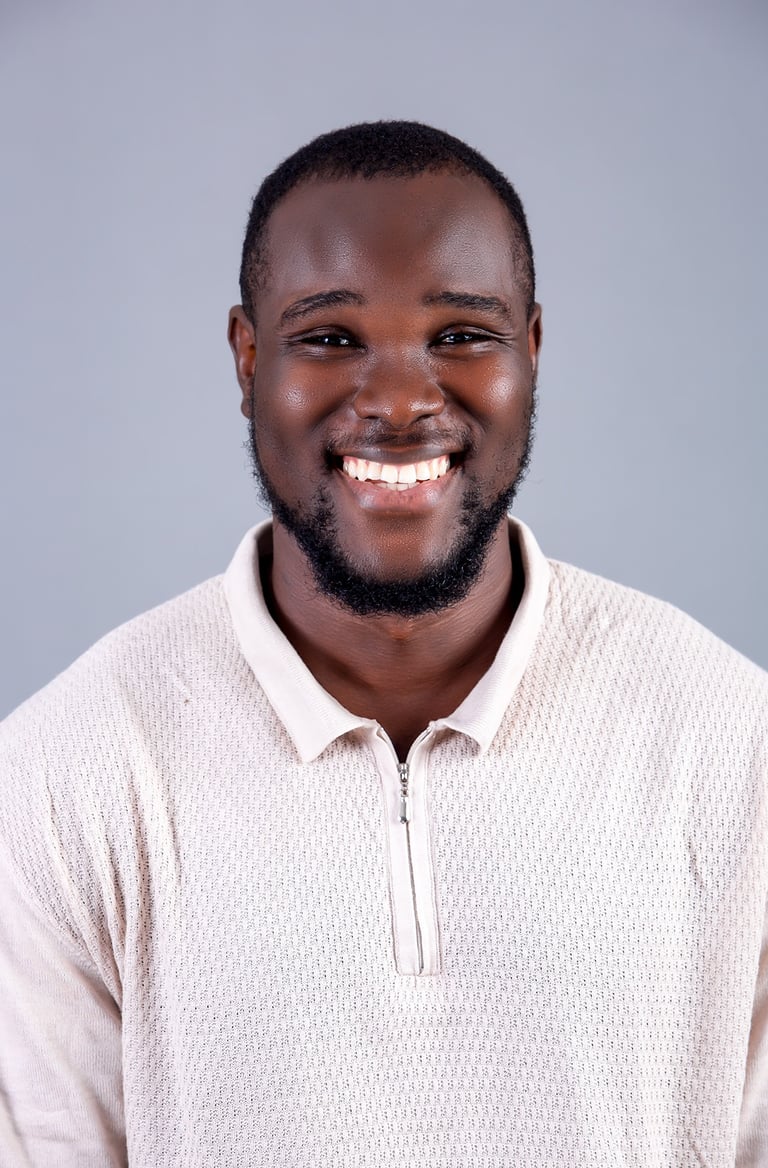 Deep Smilling Headshot Of Melvin Dain