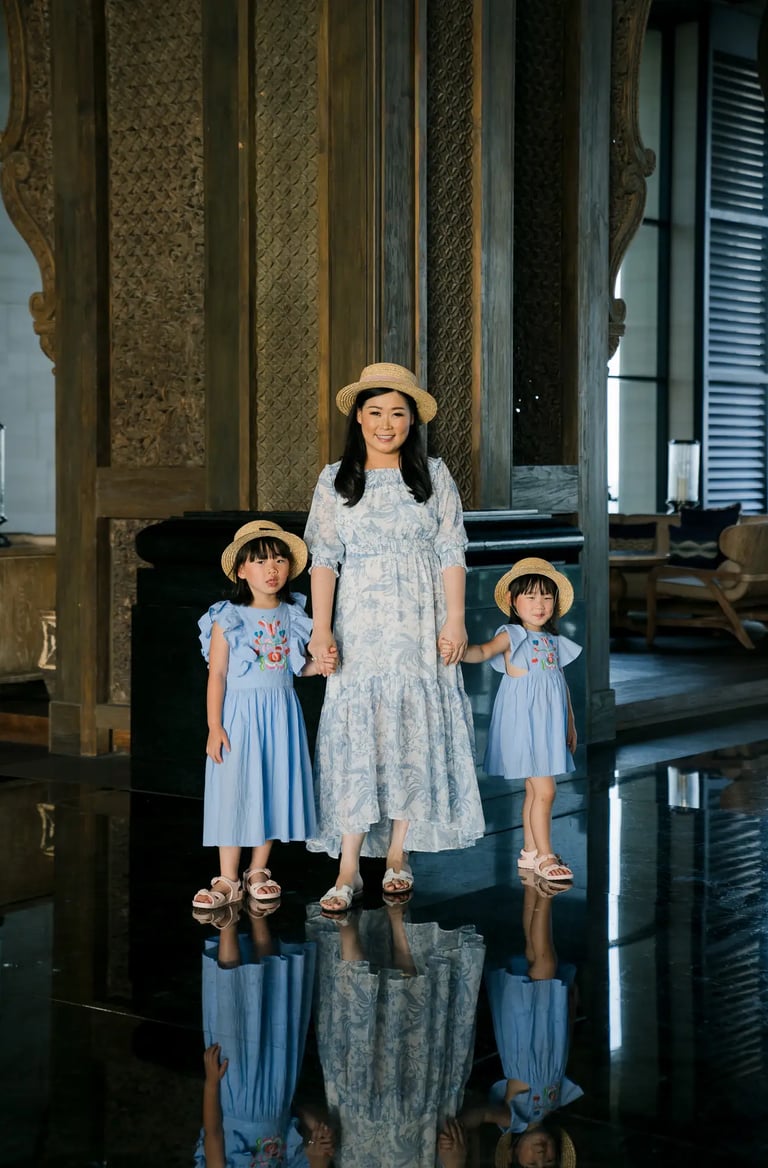 family-reflection Family portrait with reflections inside the Grand Lobby at The Apurva Kempinski Bali