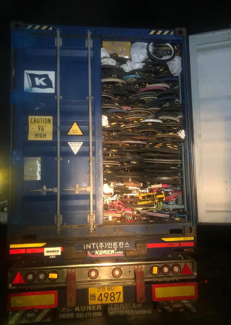 OINO, used bicycles and other goods loaded in a container for export to Afghanistan
