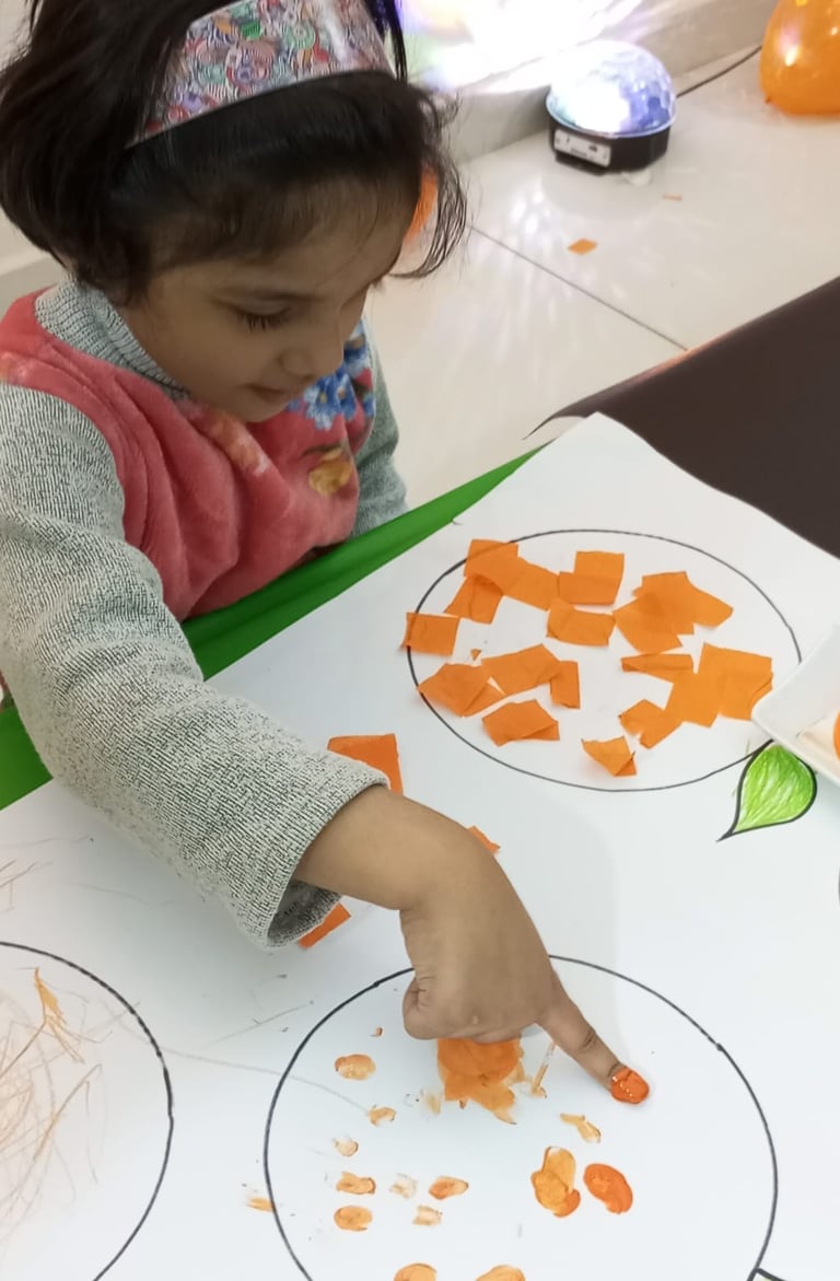 Child enjoying tactile play with sensory materials