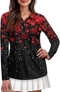 a woman in a black and white dress with hearts on it