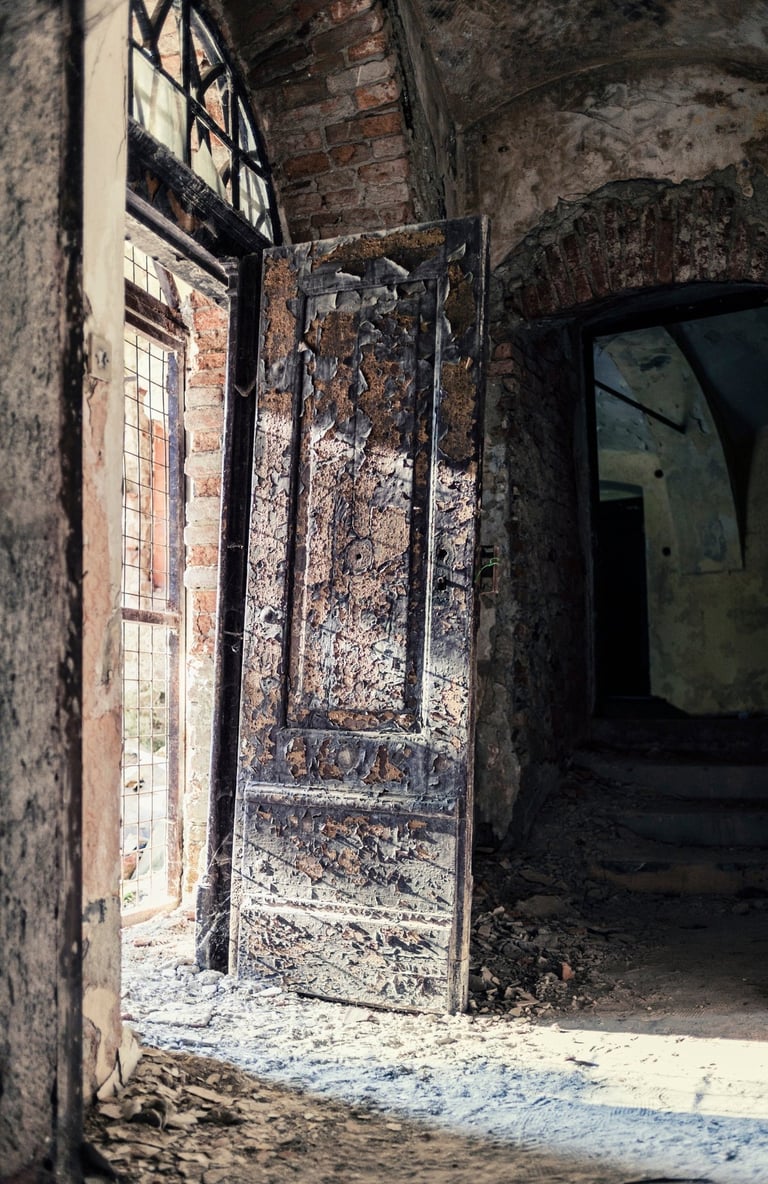 Abandoned underground stone corridor inside an old castle connected to paranormal exploration