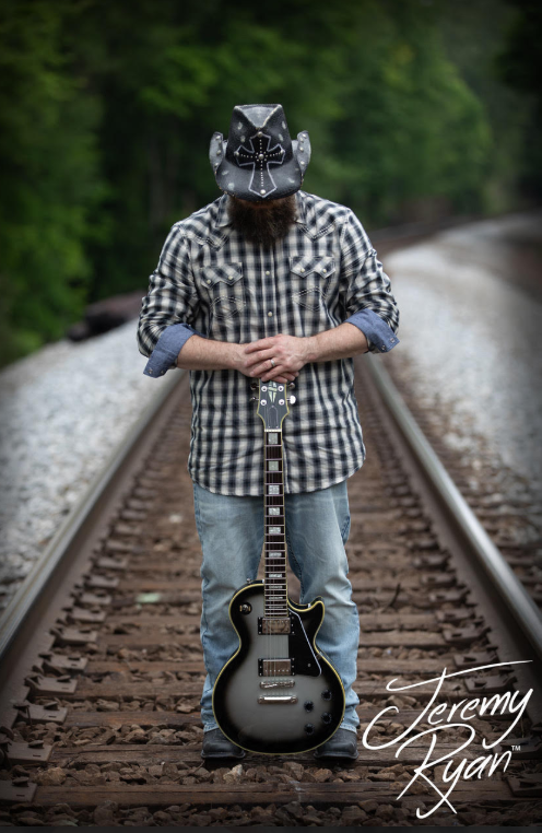 a man with a guitar and a guitar