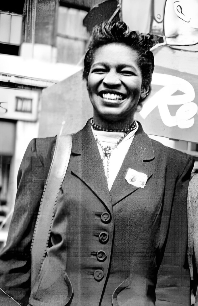 Smiling Claudia Jones representing the They Did I Can Too Creatives pioneers and icons section.