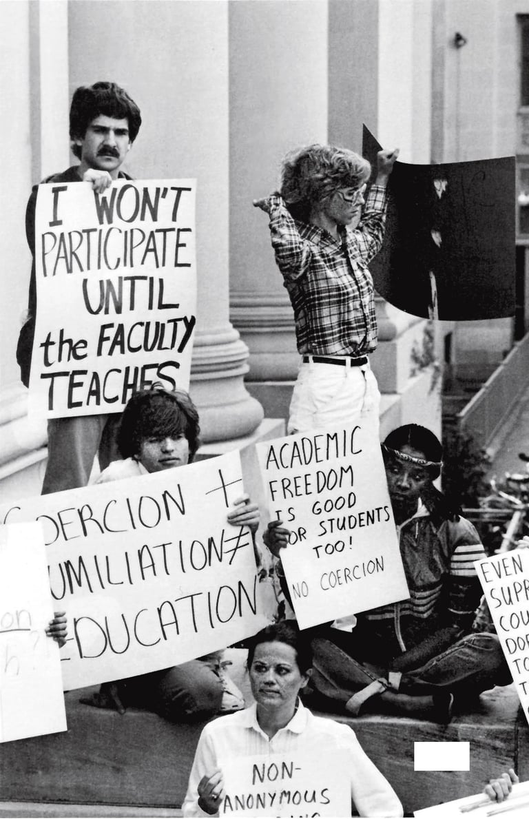 a group of people holding protest signs
