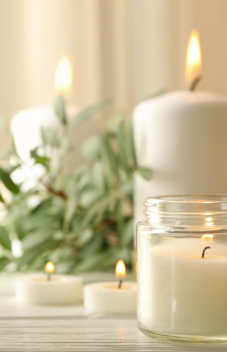 a candle with candles and candles on a table