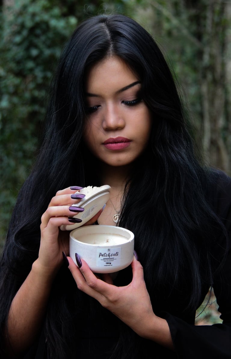 rangliciene showcasing her handmade scented soy candle