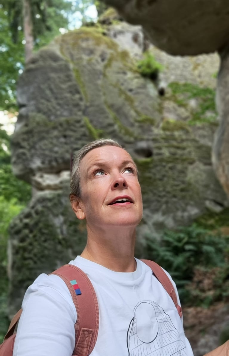 a woman hiking in the mountains