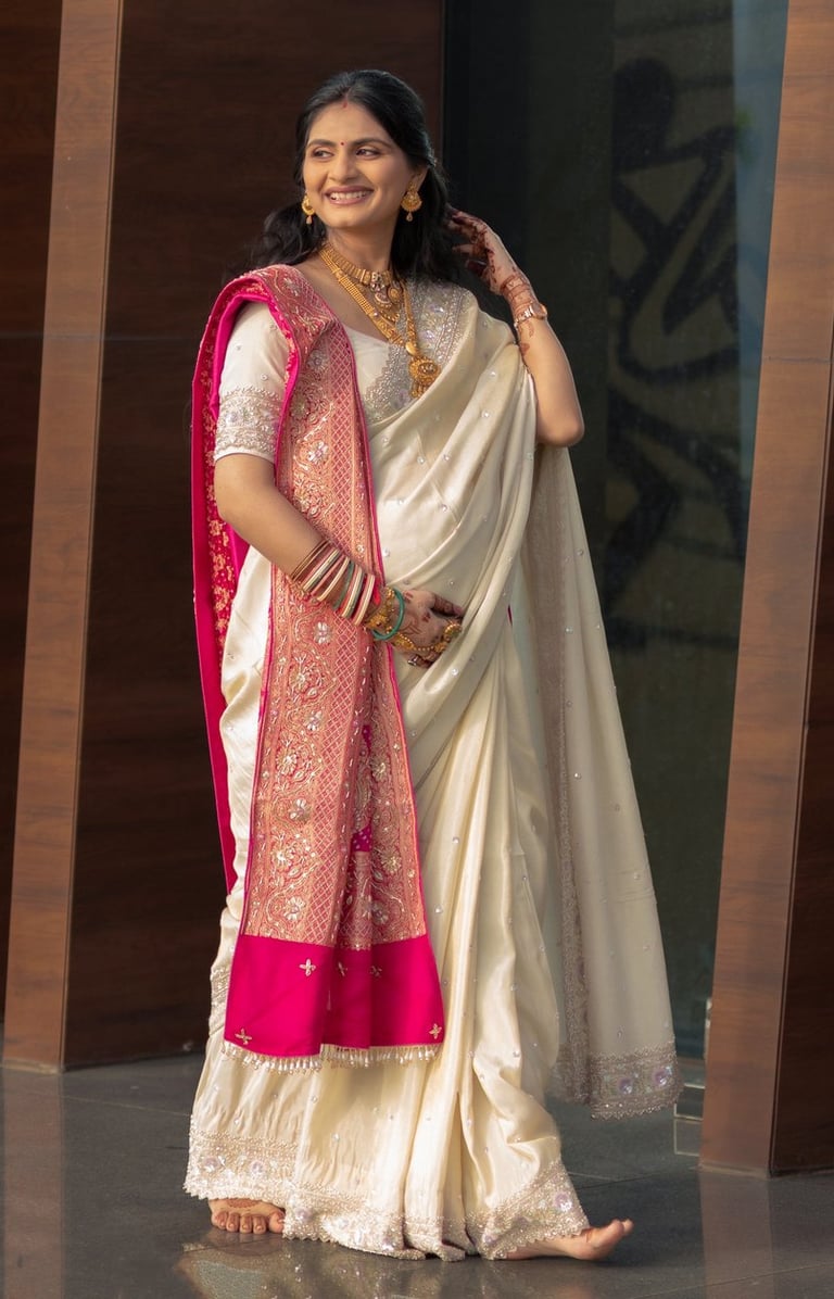 "Beautiful baby shower bride in Vadodara smiling with natural glam makeup by R&D Bridal Studio,