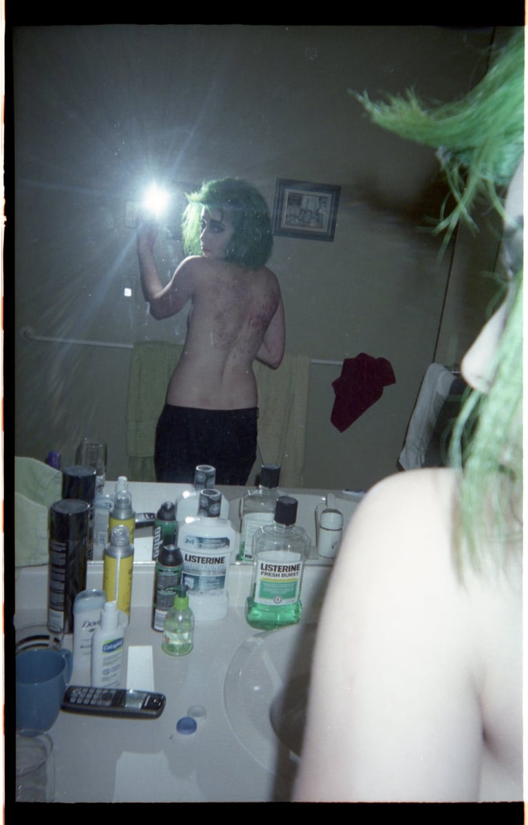 Mirror self-portrait in my childhood bathroom.