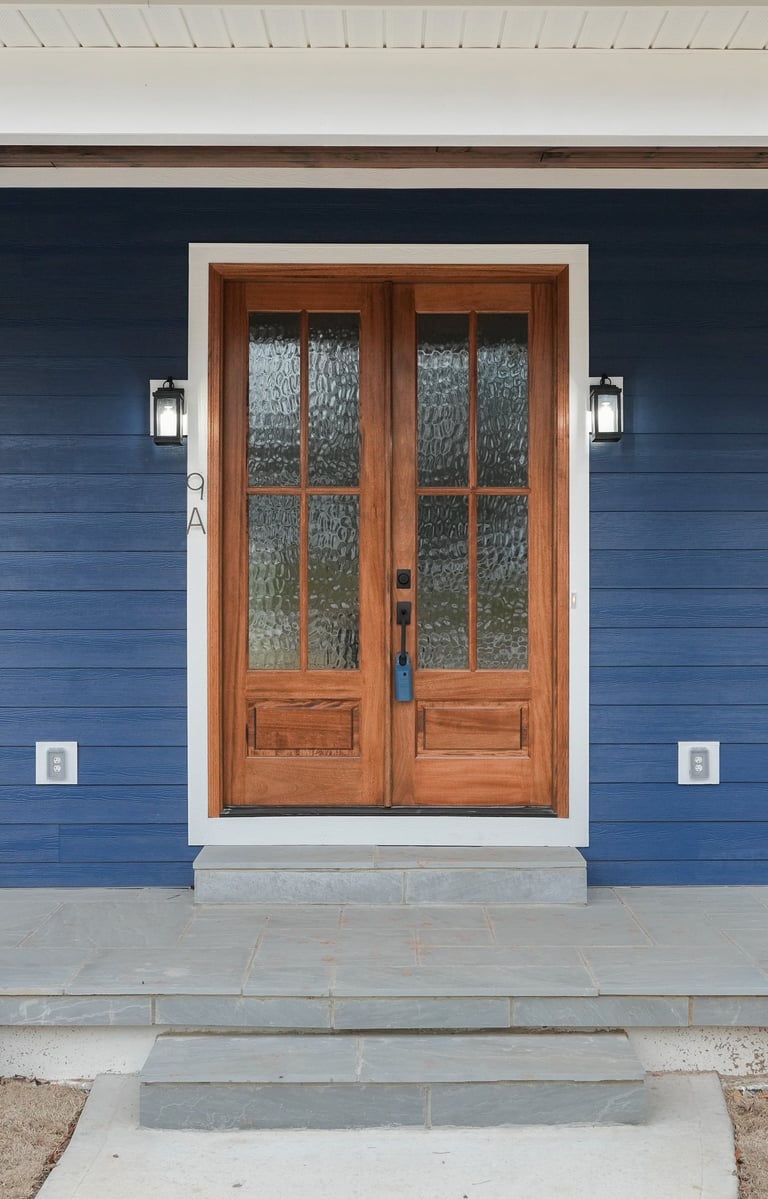Striking modern entryway with clean lines, warm lighting, and bold design that leaves a lasting impr