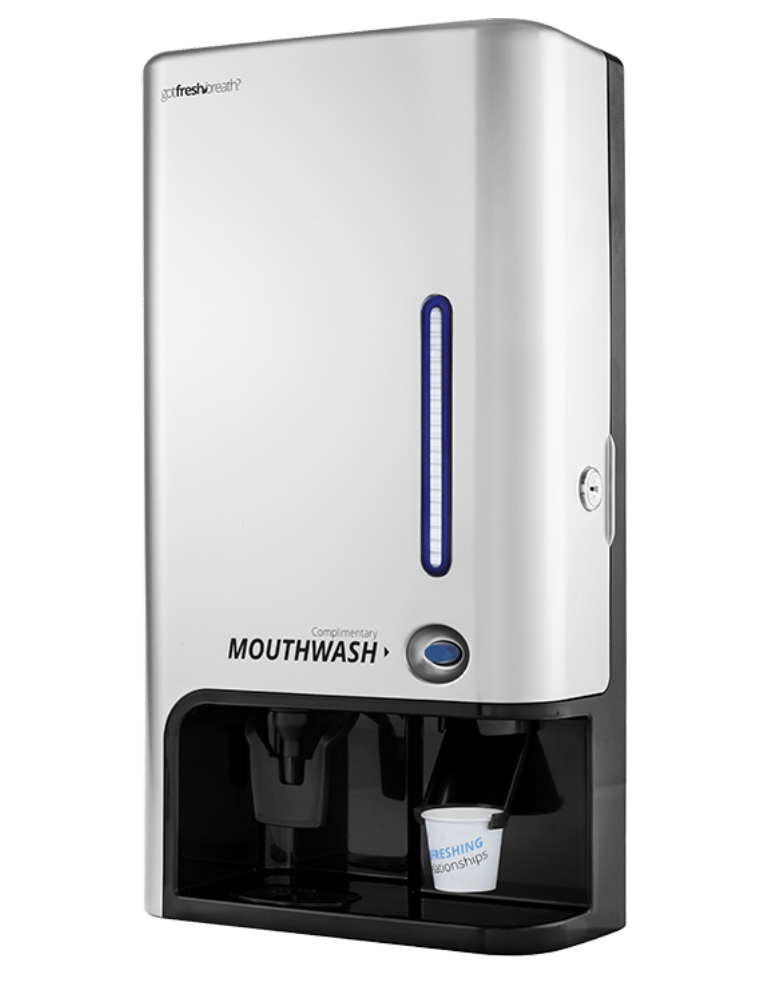 Dispensador sin contacto de enjuague bucal en acabado metálico, perfecto para hoteles y más.