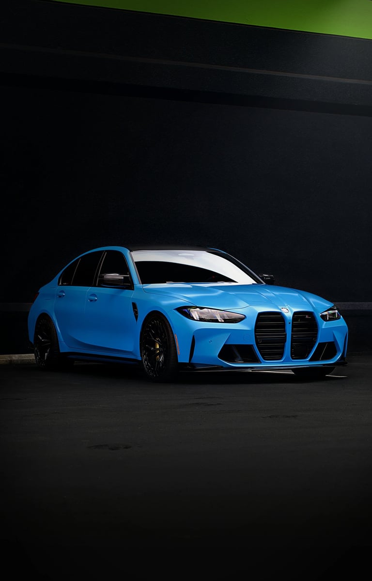 Electric blue BMW M3 Competition XDrive car photography at 704 Exotics in Charlotte, North Carolina.