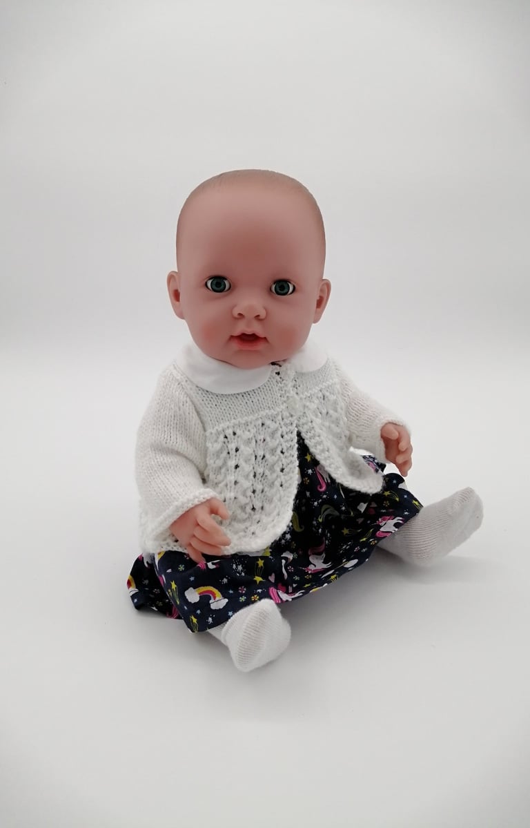 Missy Kissy baby doll in handmade dress and lacy cardigan