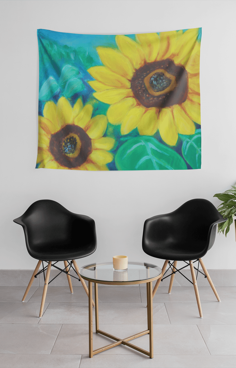 a sunflower tapestry hanging on a wall