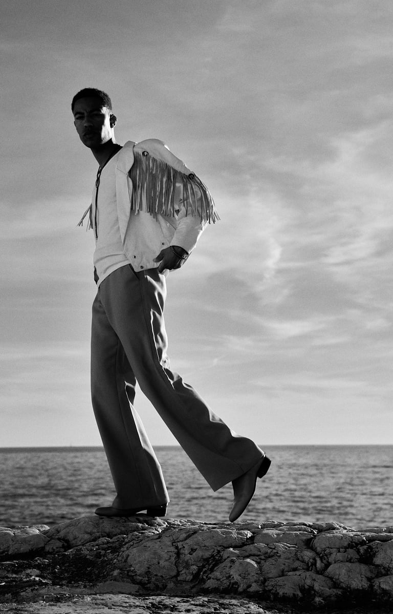 man standing in front of the sea in endoume marseille