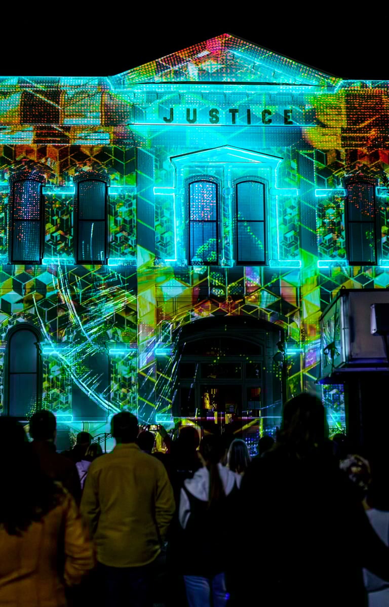 a building with a large projection screen on it