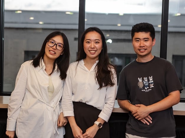 Attendees networking at Bridge City Connections event.