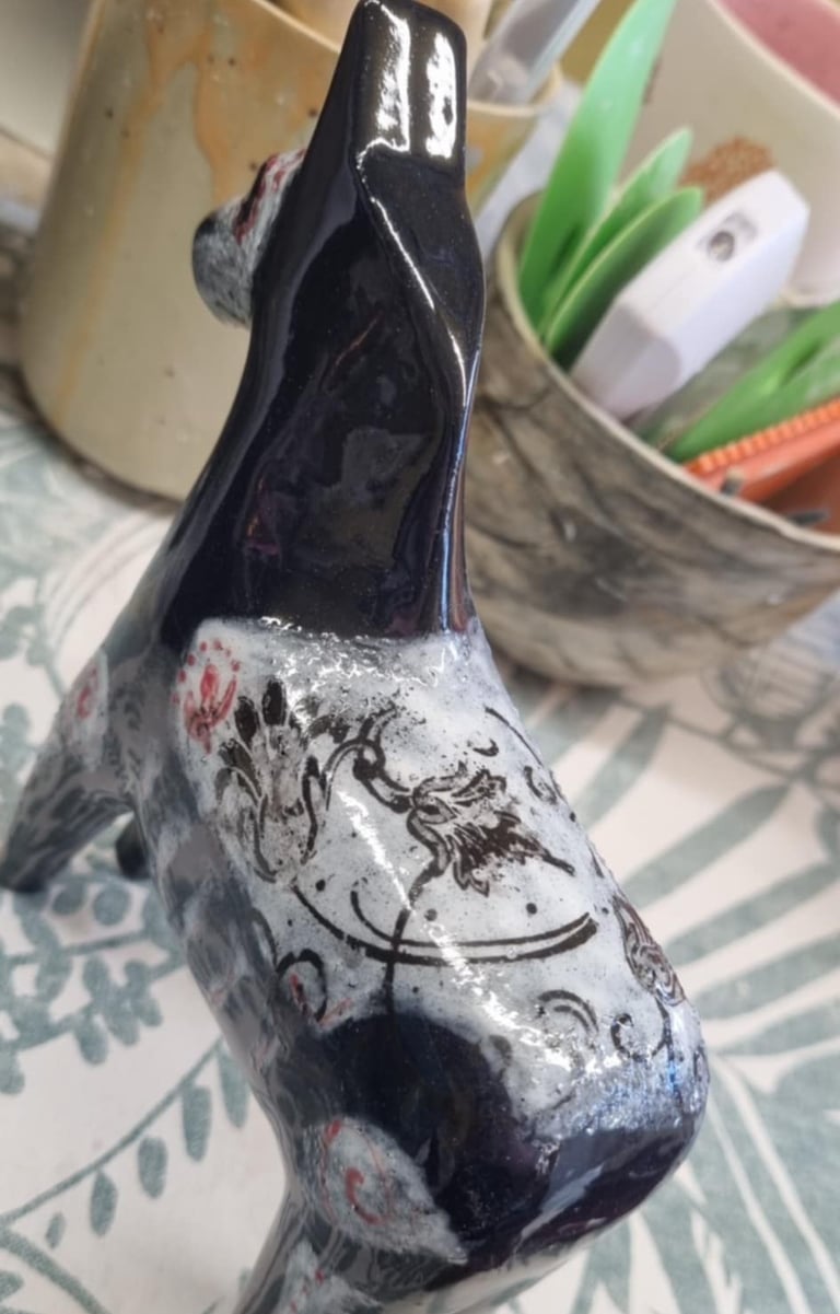 Our sugar skull Dala horse got all these pinholes on his saddle. We'll try again with him