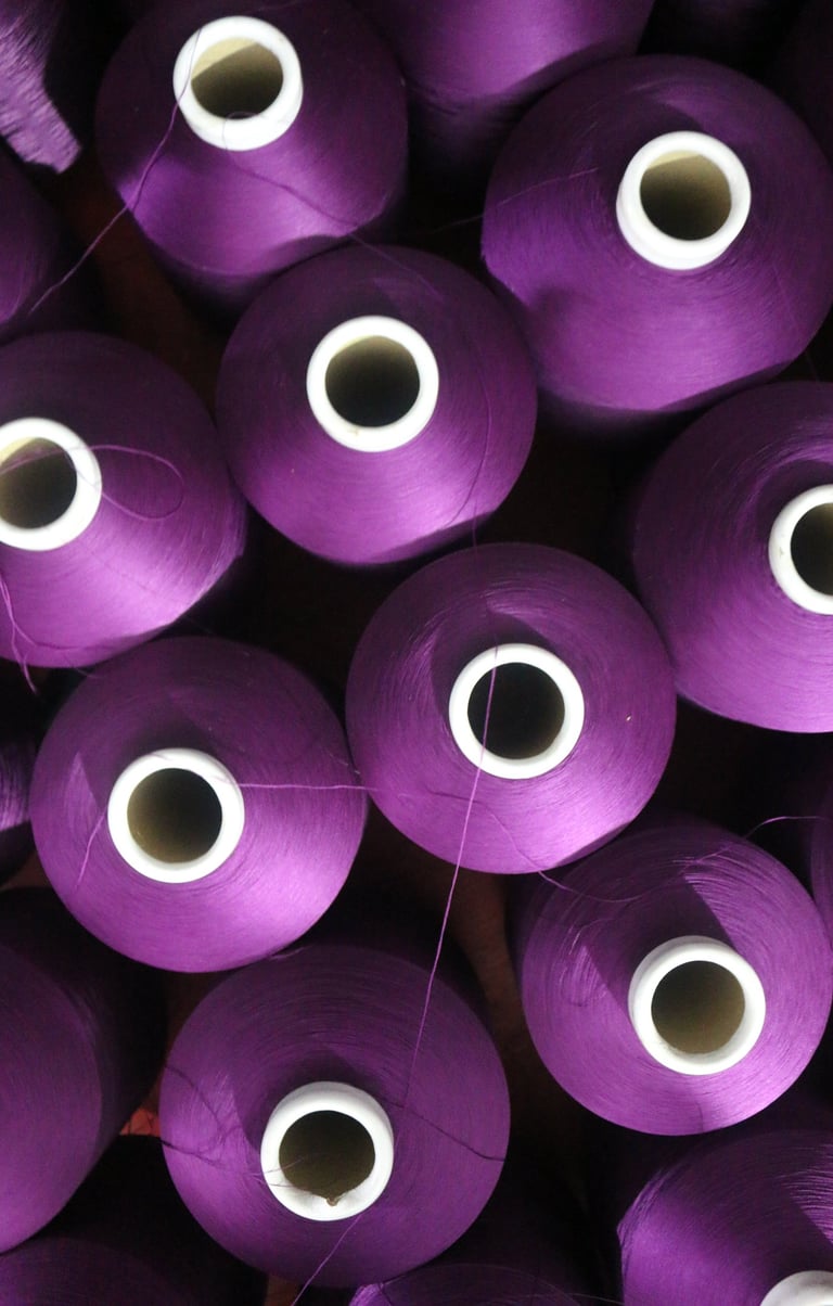 Purple yarn cones from top view