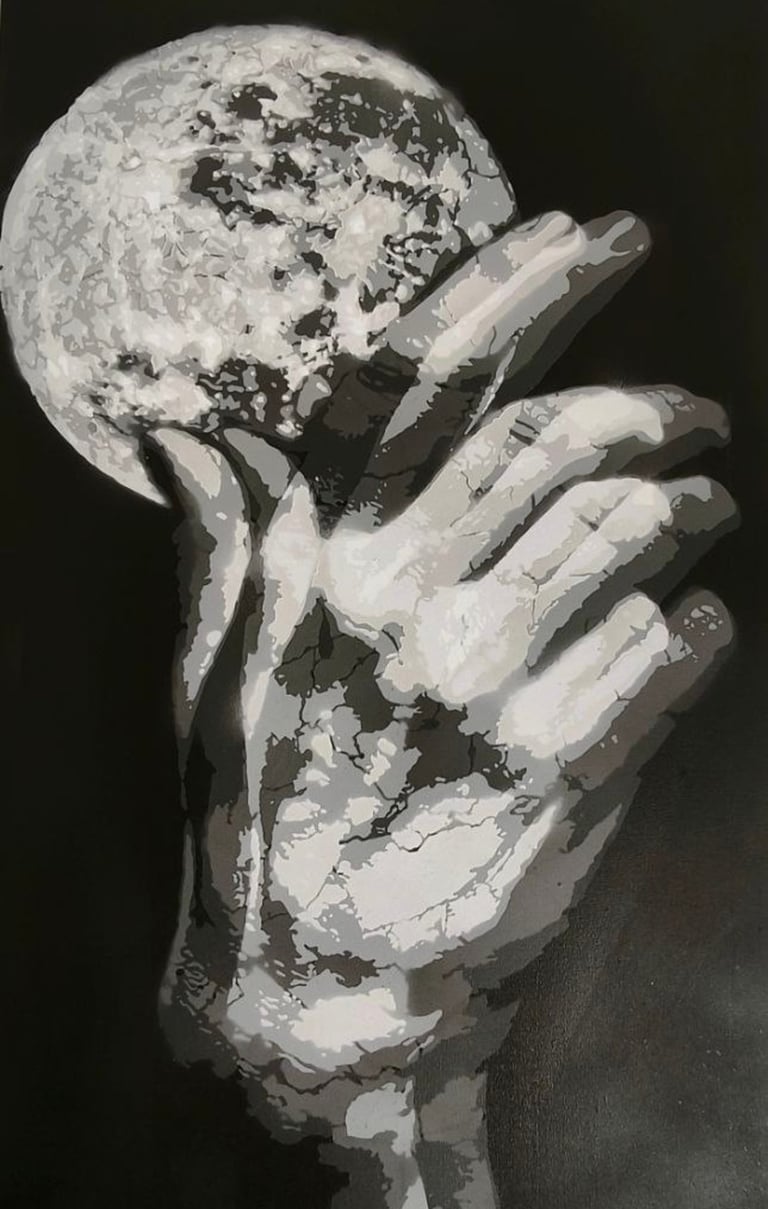Black and white mural showing hands holding the moon, a symbolic artwork by Poliops.
