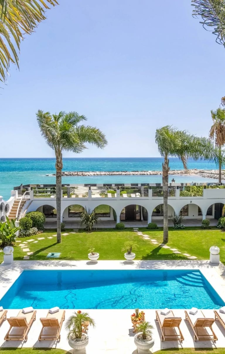 Beachfront garden and pool area in luxury villa Marbella near Puerto Banus