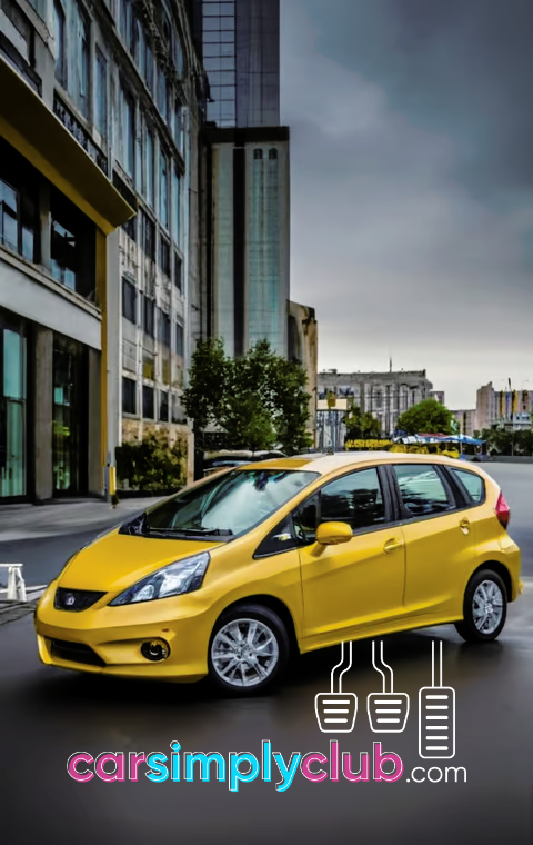a yellow Nissan Versa parked on the side of a street
