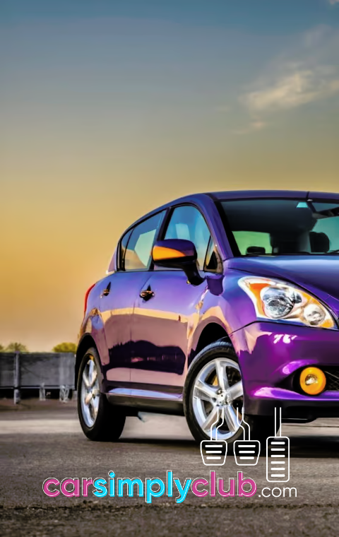 a purple Nissan Versa parked in a parking lot