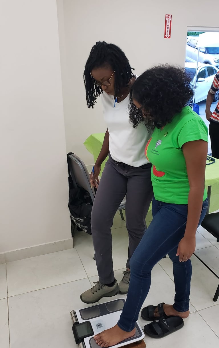 a woman standing on a scale with the nutritionist