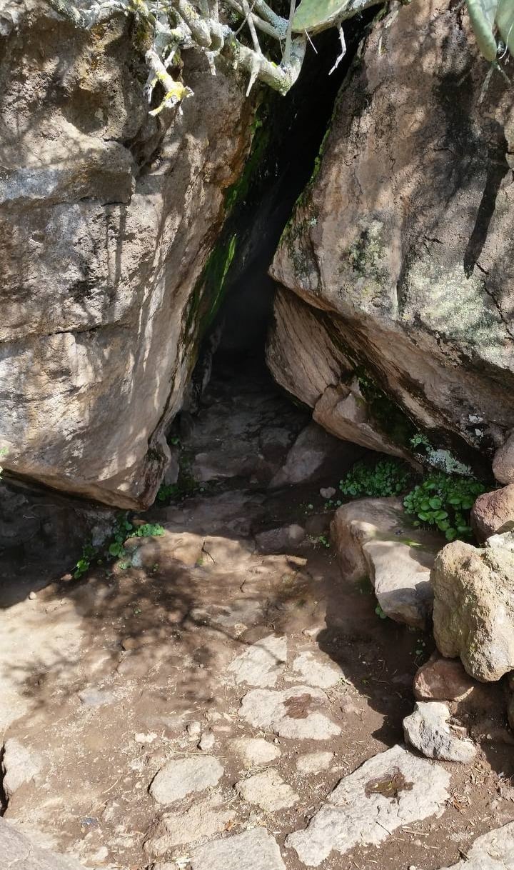 Benikulà cave in Pantelleria with natural steam rising from volcanic rocks