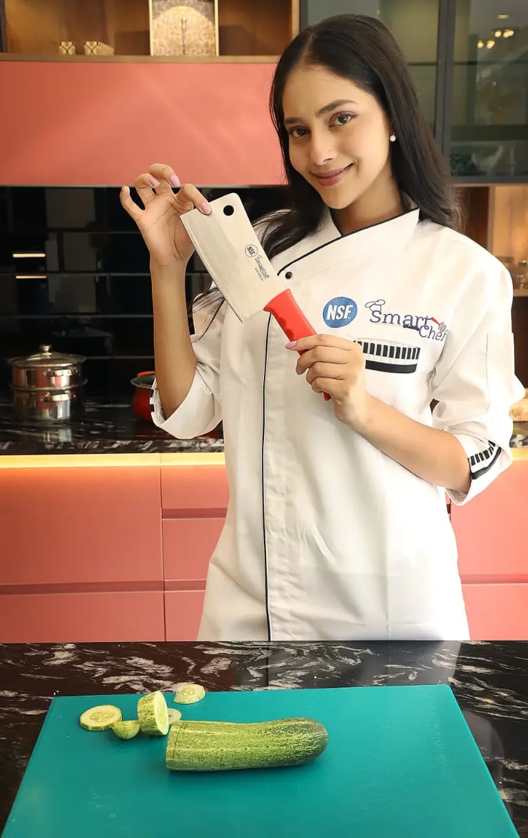 smart chef in white uniform holding a professional chopper smart chef