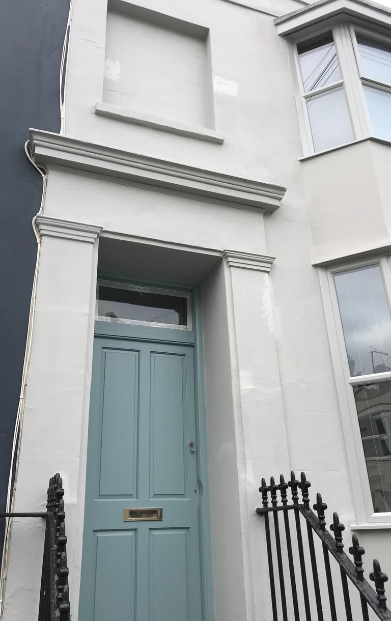Townhouse exterior painting in Shoreham-by-Sea Sussex, white facade and painted door