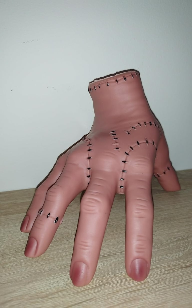 Realistic latex “Thing” hand from the Addams Family for Halloween décor, cosplay, and playful scares