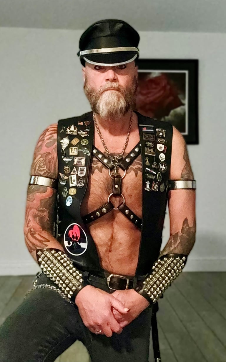 Man in full leather gear.