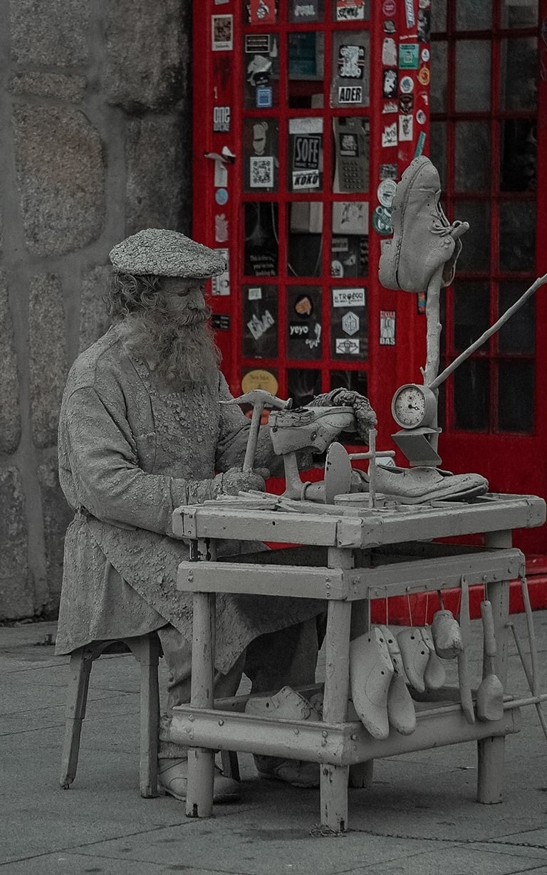 Zapatero en las calles de Oporto