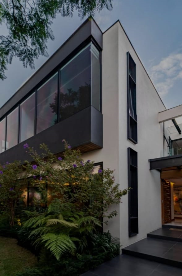 a modern house with a large glass window