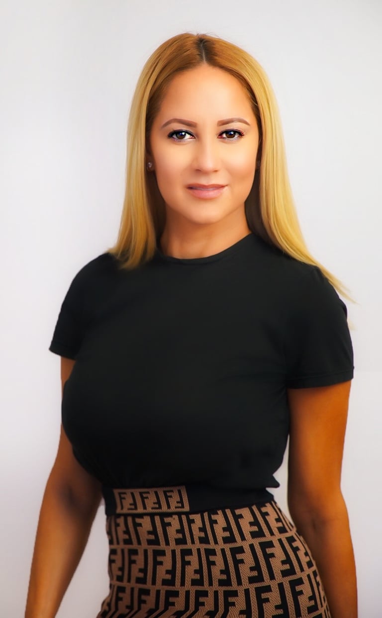a real estate agent - woman in a black top and a brown fendi skirt