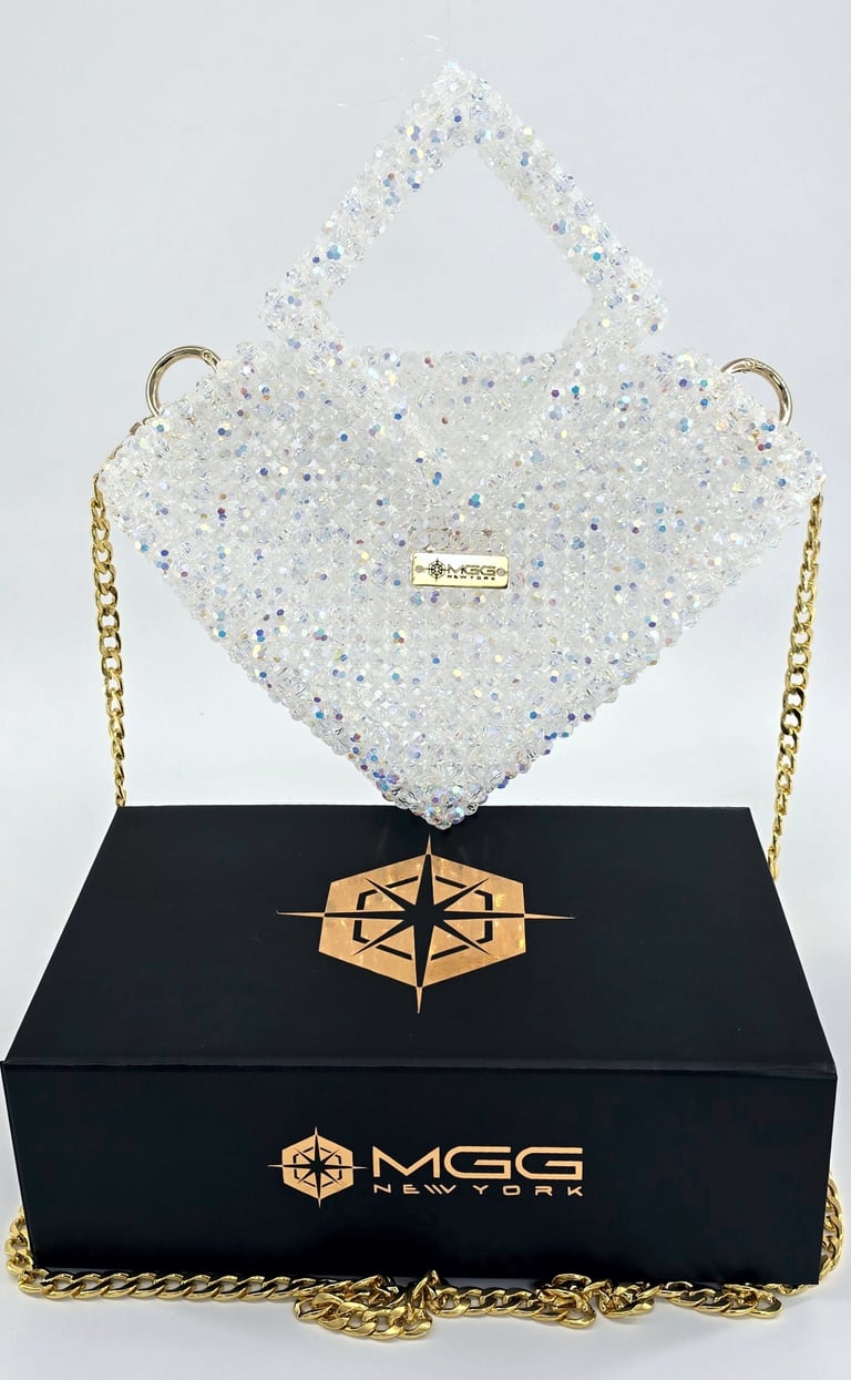 Diamond-shaped luxury handbag handcrafted with iridescent clear crystal beads, top handle and chain