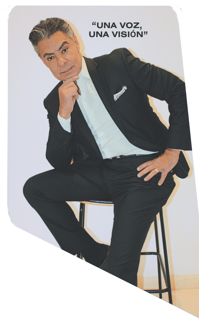 a man in a suit and tie is posing for a picture