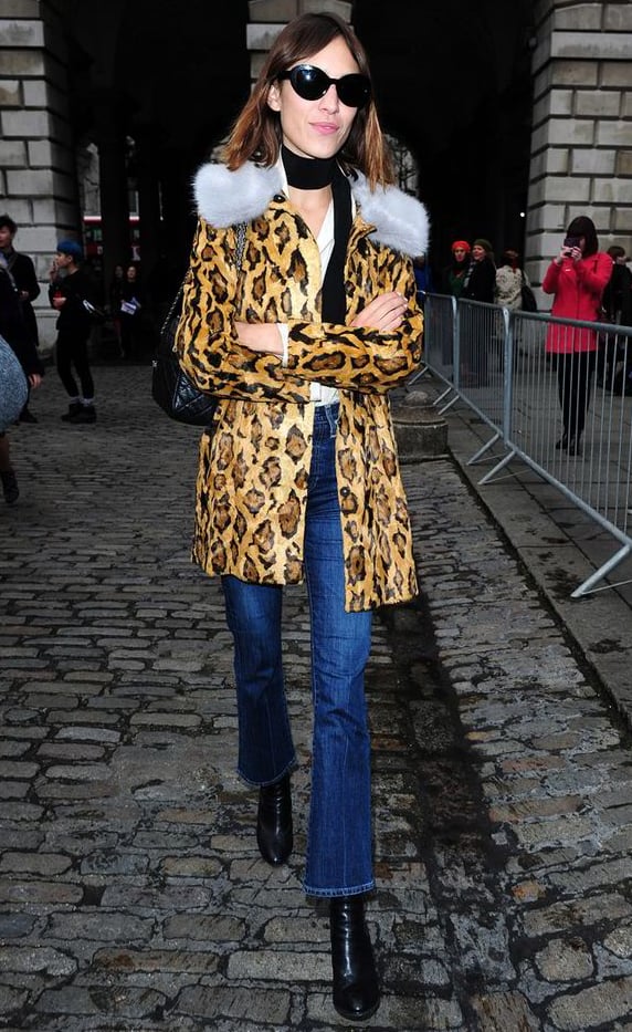 Alexa Chung wearing Shrimps coat outdoors.