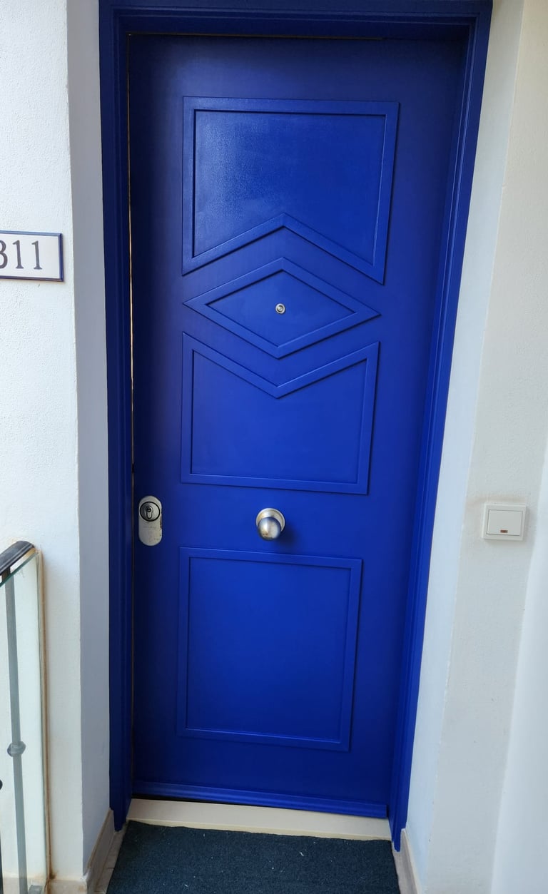 a blue door with a sign that says,'i am sorry to see the