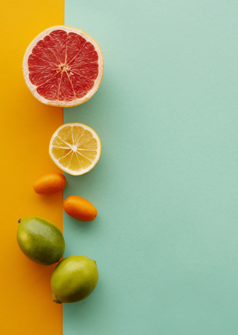 a variety of fruits and vegetables on a colorful background