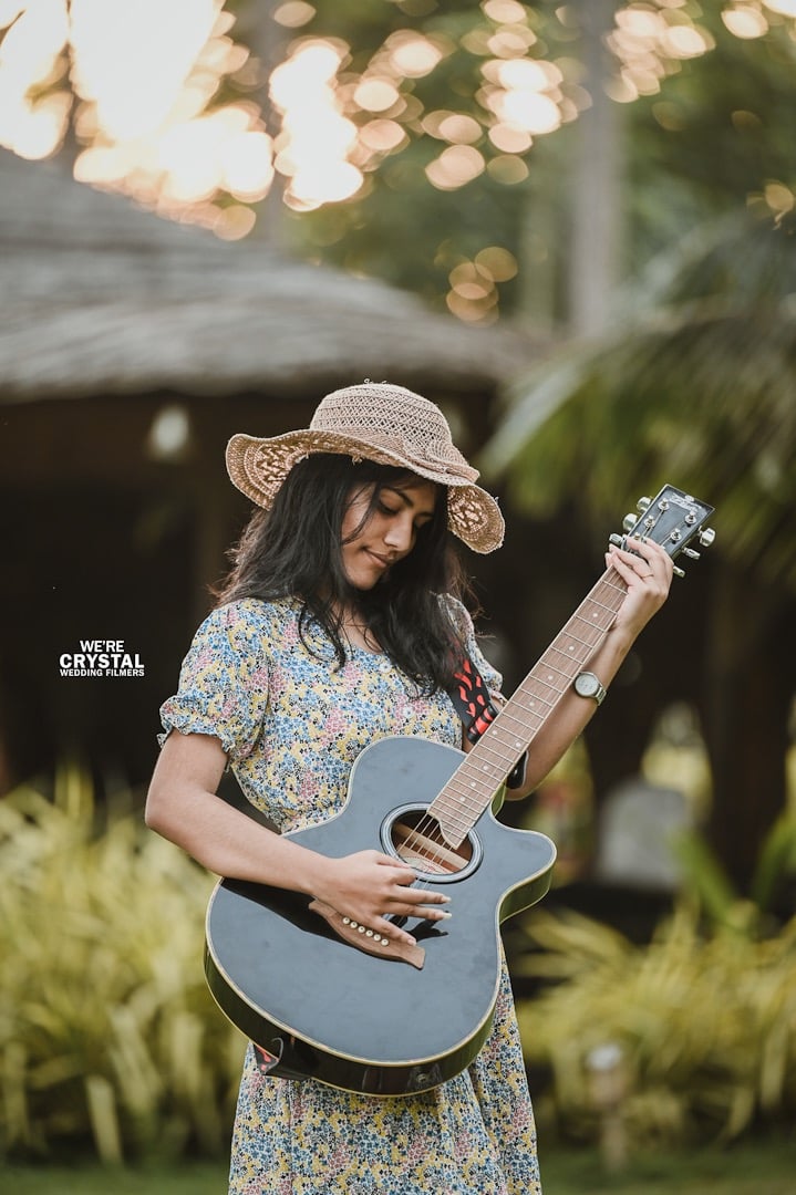 bride playing a guitar
