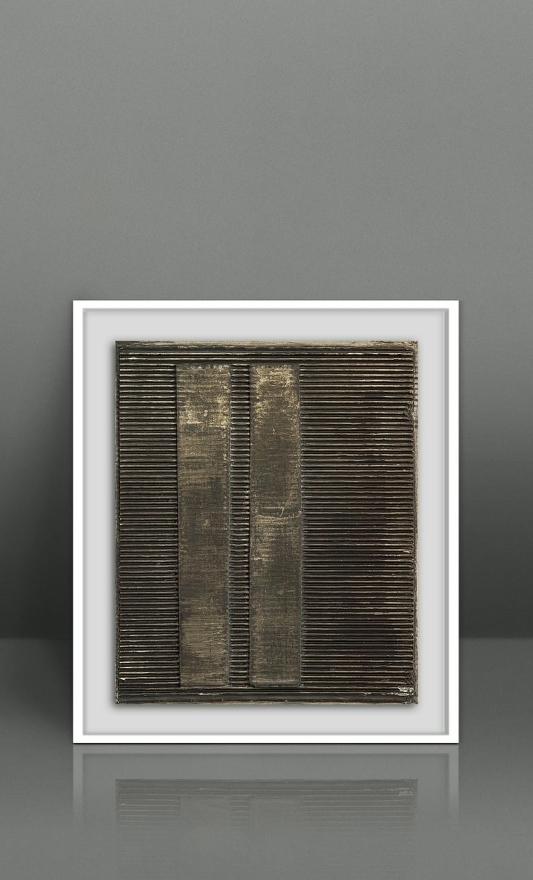 Framed gold and black abstract textured wall art featuring vertical metallic bands on a ribbed background.
