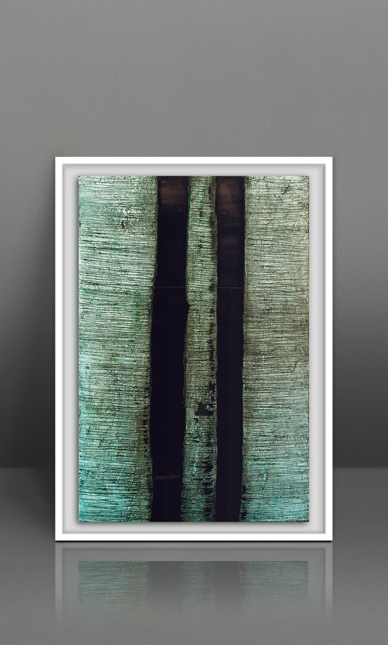 Framed abstract art print with textured teal and dark vertical stripes.