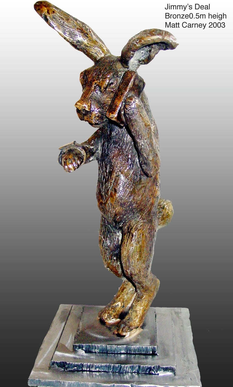 a bronze sculpture of a rabbit withon the phone looking at his watch