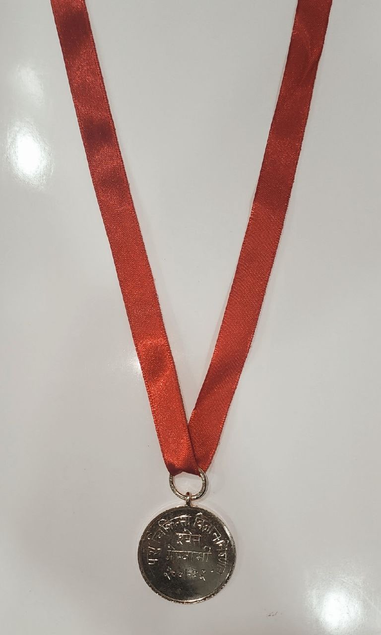 Gold medal with a red ribbon symbolizing achievement and excellence.