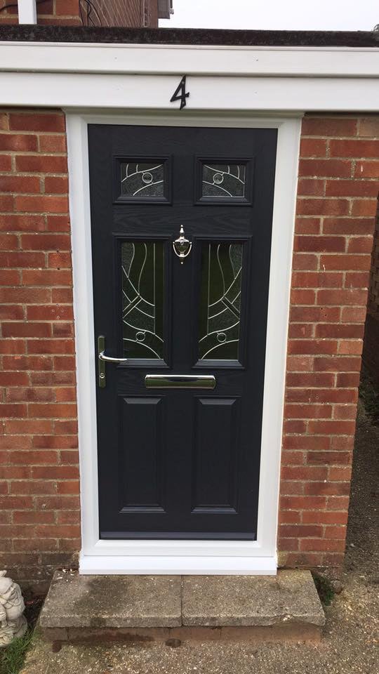 black composite door with chrome hardware and patterned glass fitted in hythe by buildmydoor
