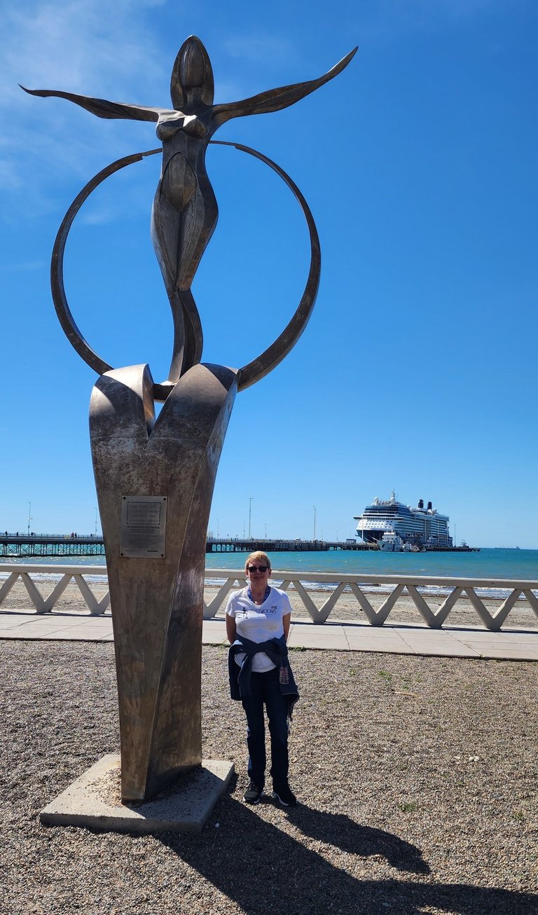 Lady Poses at the Monument to Women in Puerto Madryn, Argentina